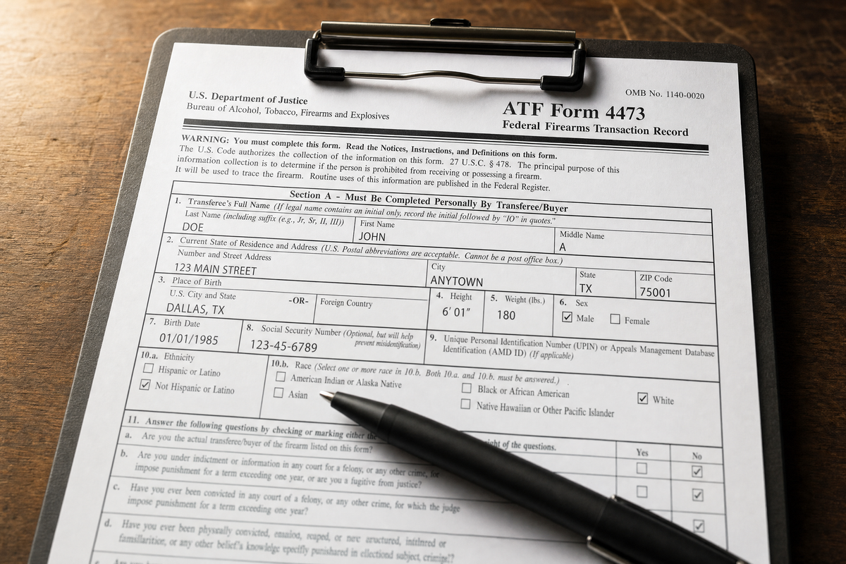 an ATF Form 4473 on a clipboard with a pen